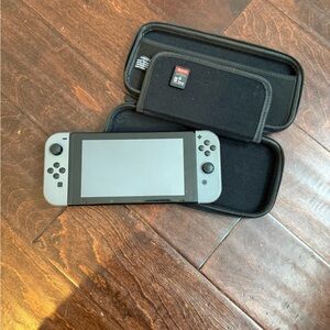 Nintendo Switch Console with Black and Gray Joy-Cons